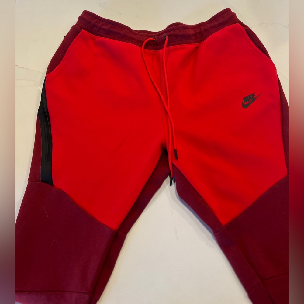 Nike Mens Red and Burgundy Joggers. Size L
